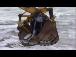Crossing a river with excavators